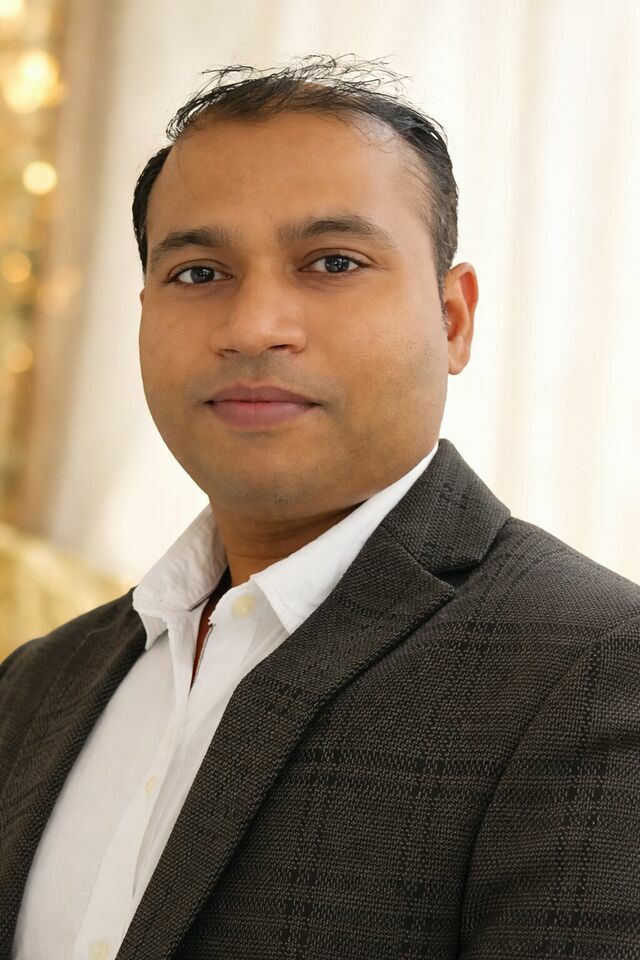 Dr. Pramod Kumar
